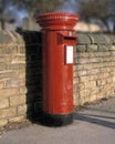 Traditional red Royal Mail pillar box Royalty Free Stock Photo