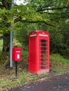 Traditional red telephone and post box in UK Royalty Free Stock Photo