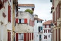 Traditional red and white half-timbered basque houses, typical architecture Royalty Free Stock Photo