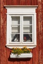 Traditional red wooden house facade in Rauma town. Finland heritage