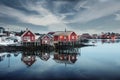 Traditional red wooden house at waterfront in fishing village on winter at Reine town, Lofoten Islands