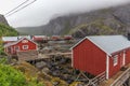 Traditional red wooden houses, rorbuer in the small fishing village of Nusfjord, Lofoten islands, Norway Royalty Free Stock Photo