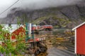 Traditional red wooden houses, rorbuer in the small fishing village of Nusfjord, Lofoten islands, Norway Royalty Free Stock Photo