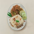 A traditional rice dish Pilaf or pilau is homemade and decorated with chicken roast