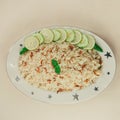 A traditional rice dish Pilaf or pilau is homemade and decorated with chicken roast