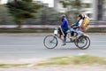 Traditional Rickshaw Transporting Passengers in Urban Setting Royalty Free Stock Photo