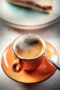 Traditional ristretto coffee with cake on cafe table Royalty Free Stock Photo