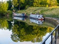 Traditional river barges converted to holiday accommodation on Avon River