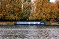 Traditional River Houseboat Moored On The River Bank