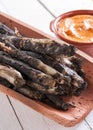Traditional roasted calsots Royalty Free Stock Photo