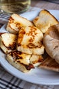 Traditional roasted or grilled halloumi cheese from Cyprus served hot with flat bread