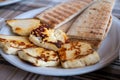 Traditional roasted or grilled halloumi cheese from Cyprus served hot with flat bread