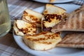 Traditional roasted or grilled halloumi cheese from Cyprus served hot with flat bread