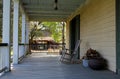 Traditional rocking chair on old veranda - feels like home Royalty Free Stock Photo