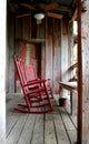 Traditional rocking chair on old veranda - feels like home Royalty Free Stock Photo