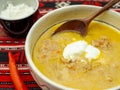 Super macro abstract feather backgroundtraditional romanian dish tripe soup known as ciorba de burta served with cream and pepper