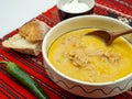 Super macro abstract feather backgroundtraditional romanian dish tripe soup known as ciorba de burta served with cream and pepper