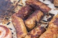 Traditional Romanian food called "mici" which consist of pork meat rolls Royalty Free Stock Photo