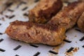 Traditional Romanian food called "mici" which consist of pork meat rolls Royalty Free Stock Photo