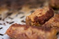 Traditional Romanian food called "mici" which consist of pork meat rolls Royalty Free Stock Photo