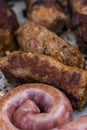 Traditional Romanian food called "mici" which consist of pork meat rolls Royalty Free Stock Photo