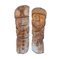 Traditional Romanian manually handcrafted wooden statues isolated on white