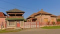 Traditional Romanian painted masonryhouses along a street in the village of Aurel Vlaicu