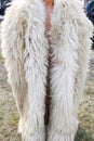 Traditional Romanian sheepskin coat for shepherd man during traditional country fair
