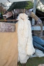 Traditional Romanian sheepskin coat for shepherd man during traditional country fair