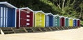 Traditional row of colourful beach huts Royalty Free Stock Photo