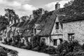 Traditional row of cottage homes in Bibury village Cotswolds, England, UK