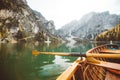 Traditional rowing boat on a lake in the Alps in fall Royalty Free Stock Photo