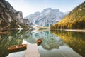 Traditional rowing boats at Lago di Braies in the Alps in fall