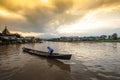 Traditional rowing boats and villagers` way of life in the middle of Inle Lake in Myanmar