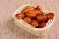 Traditional Russian baked pies pirozhki patties in a basket. Ruddy yeast buns with a golden crust. Pies can be cooked with Royalty Free Stock Photo