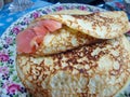 Traditional russian blini with lightly salted smoked salmon. Pancakes. Pancake week. Maslenitsa is an Eastern Slavic traditional