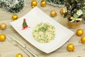 Traditional Russian christmas salad Olivier with sausage and fresh cucumbers Royalty Free Stock Photo