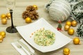 Traditional Russian christmas salad Olivier with sausage and fresh cucumbers Royalty Free Stock Photo