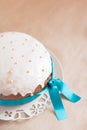 Traditional Russian Easter cake with frosting and blue ribbon Royalty Free Stock Photo
