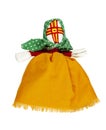Traditional Russian fabric doll. A doll in an orange dress and a green scarf. Home amulet and children\'s toy