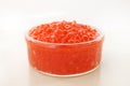 Traditional russian food. Red salmon caviar in glass jar. Royalty Free Stock Photo