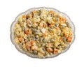 Traditional Russian Olivier salad in glass bowl on white background. Top view