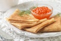 Traditional Russian pancakes blini with salmon caviar Royalty Free Stock Photo