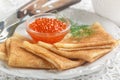 Traditional Russian pancakes blini with salmon caviar Royalty Free Stock Photo