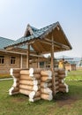 Traditional Russian rustic wooden well in the Altai Mountains