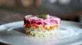 Traditional Russian salad with beetroot and herring vegetables, lying on a wooden table in a white plate Royalty Free Stock Photo