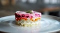 Traditional Russian salad with beetroot and herring vegetables, lying on a wooden table in a white plate Royalty Free Stock Photo