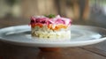 Traditional Russian salad with beetroot and herring vegetables, lying on a wooden table in a white plate Royalty Free Stock Photo