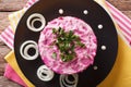 Traditional Russian salad Herring under a fur coat close-up. Horizontal top view