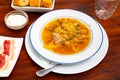 Shchi, cabbage soup cooked on mushroom broth with pork and sour cream Royalty Free Stock Photo